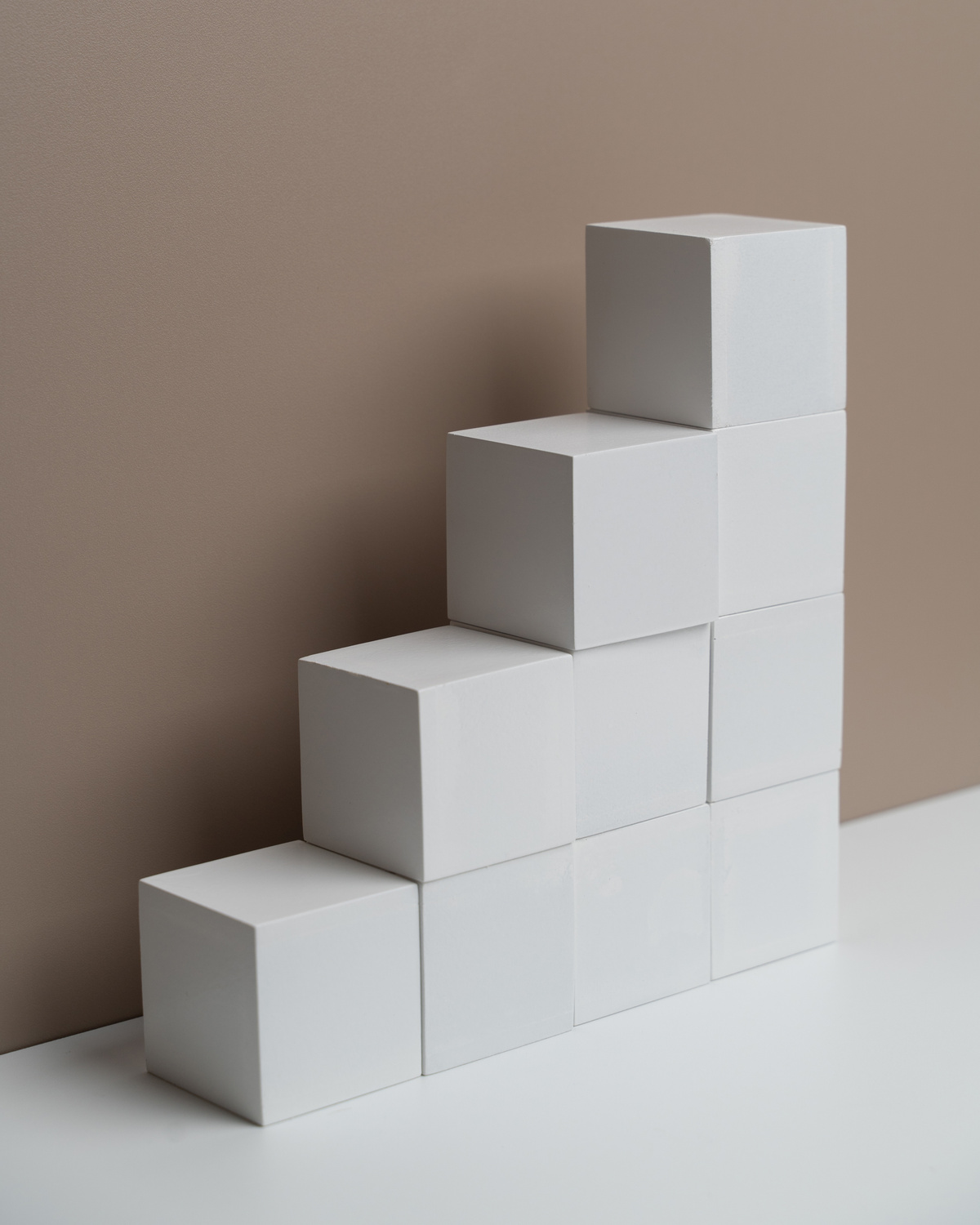 Stacks of White Cubes Forming Steps